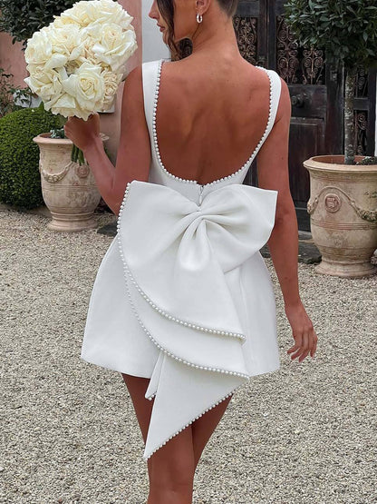 Ruby Elegant Pearl Bow Fitted Mini Dress