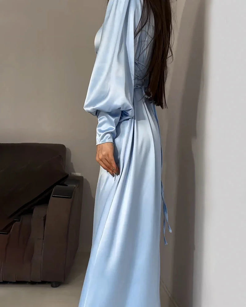 Elegant waisted pleated cuff dress