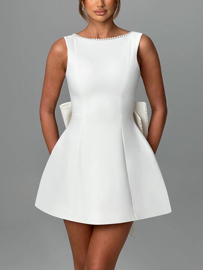 Ruby Elegant Pearl Bow Fitted Mini Dress